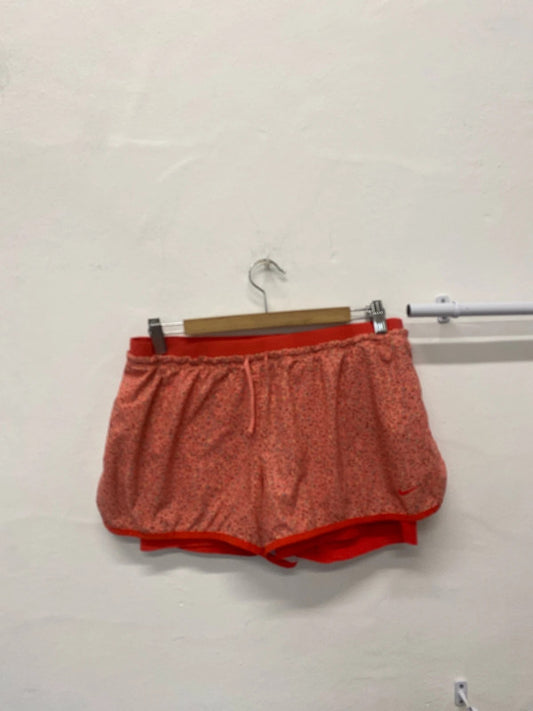 Fabulous Nike Dri-Fit ditsy coral orange shorts UkXL NN001