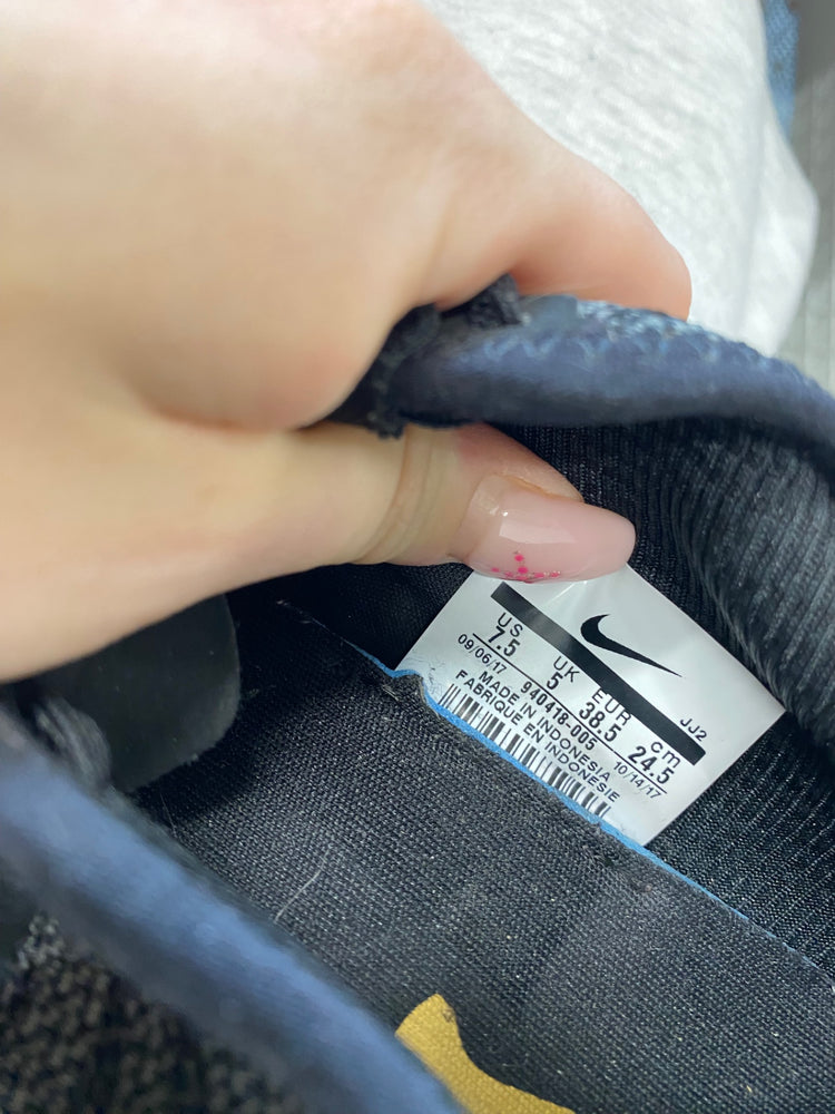 Fabulous Nike dual tone racer Sneakers UK 5 Black and Gold