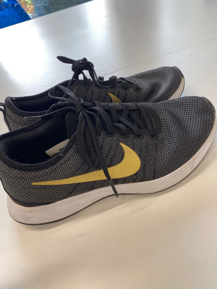 Fabulous Nike dual tone racer Sneakers UK 5 Black and Gold