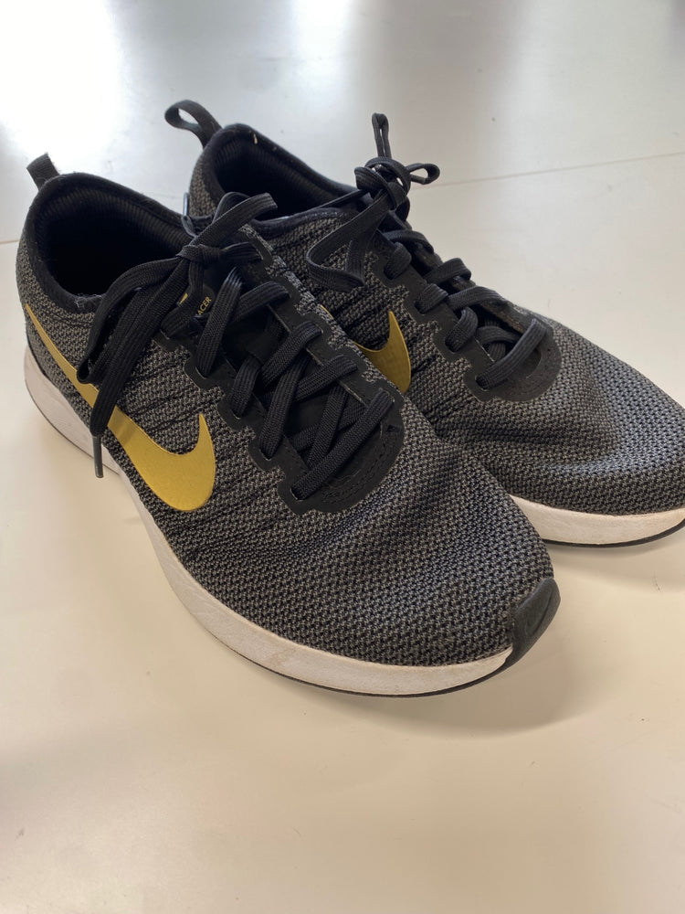 Fabulous Nike dual tone racer Sneakers UK 5 Black and Gold