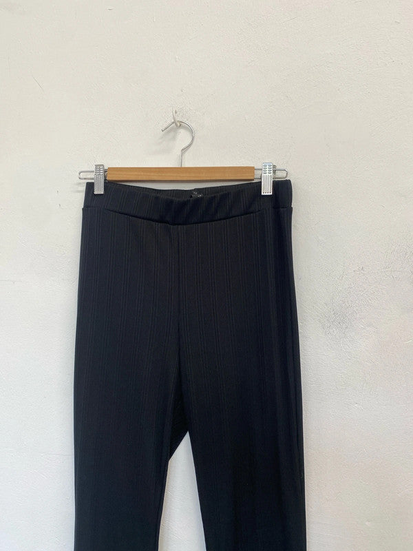 Lovely river island black ribbed flare trousers UK 10 PJ001