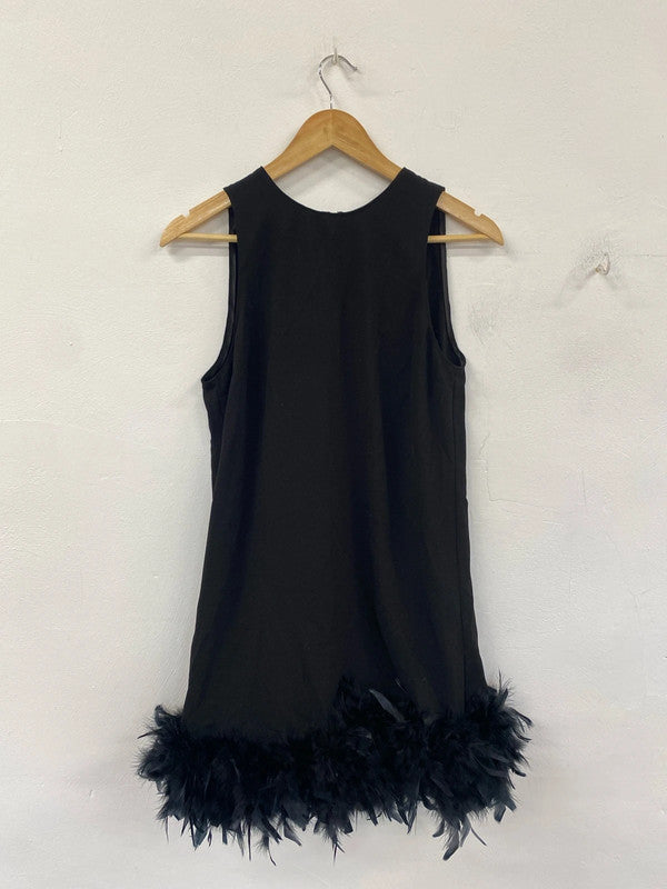 Stunning river island black dress with a beautiful feather edge uk 8 KM004