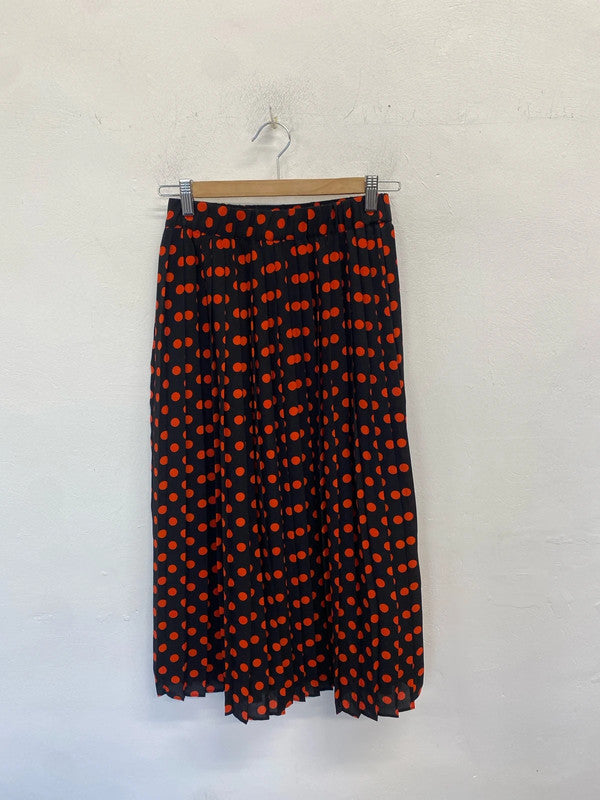 Lovely warehouse red black spotty pleated skirt UK 6 HDR01