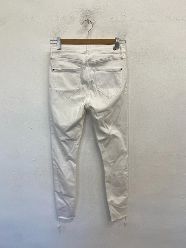 Lovely river island white ripped raw hem skinny jeans UK 10 CJ001