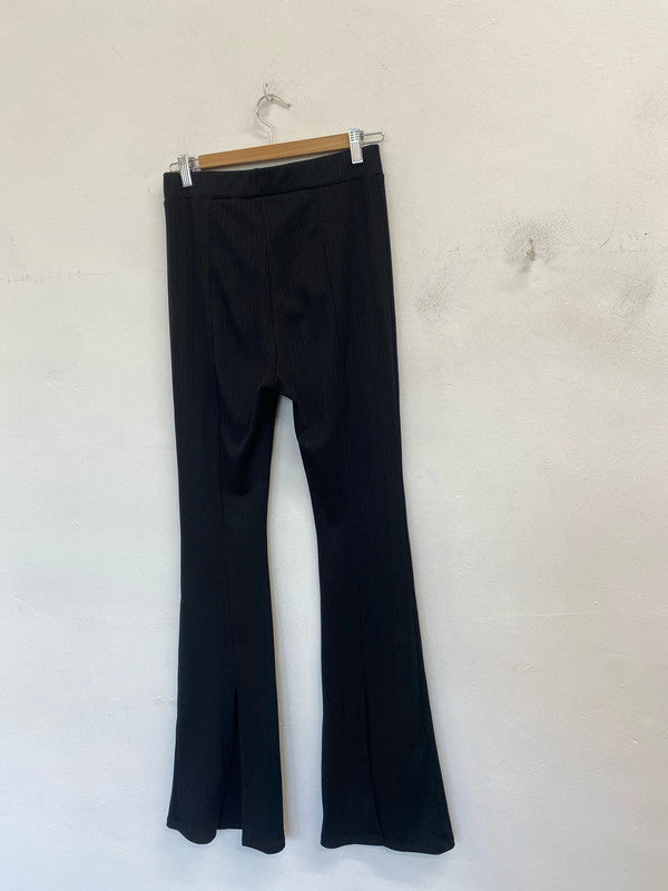 Lovely river island black ribbed flare trousers UK 10 PJ001