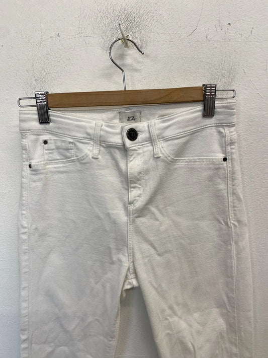Lovely river island white ripped raw hem skinny jeans UK 10 CJ001