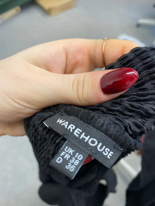 Lovely warehouse black crepe jumpsuit open shoulder UK 10 GK002