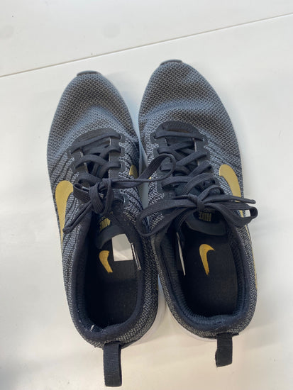 Fabulous Nike dual tone racer Sneakers UK 5 Black and Gold