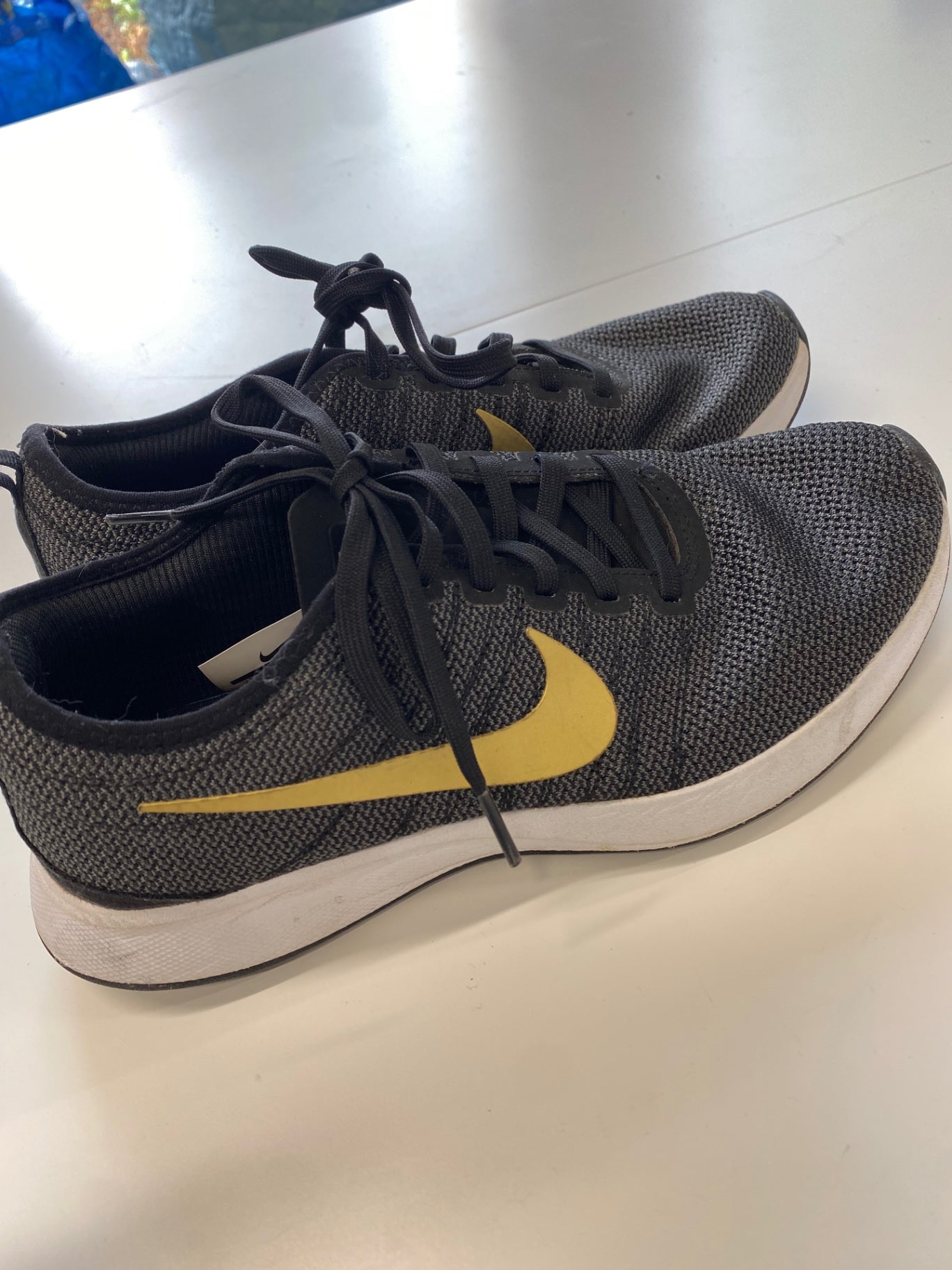 Fabulous Nike dual tone racer Sneakers UK 5 Black and Gold
