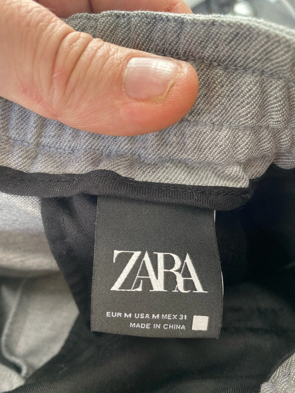 Great pair of Zara casual smart trousers light grey M LL003