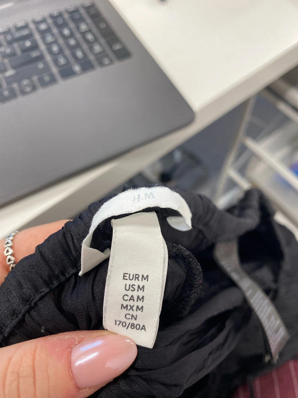 Lovely H&M pleated black Harlem pants UK M KS002