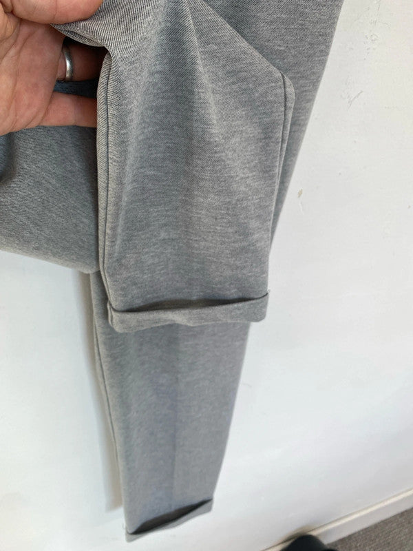 Great pair of Zara casual smart trousers light grey M LL003