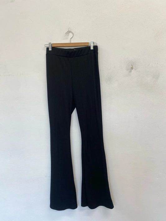 Lovely river island black ribbed flare trousers UK 10 PJ001